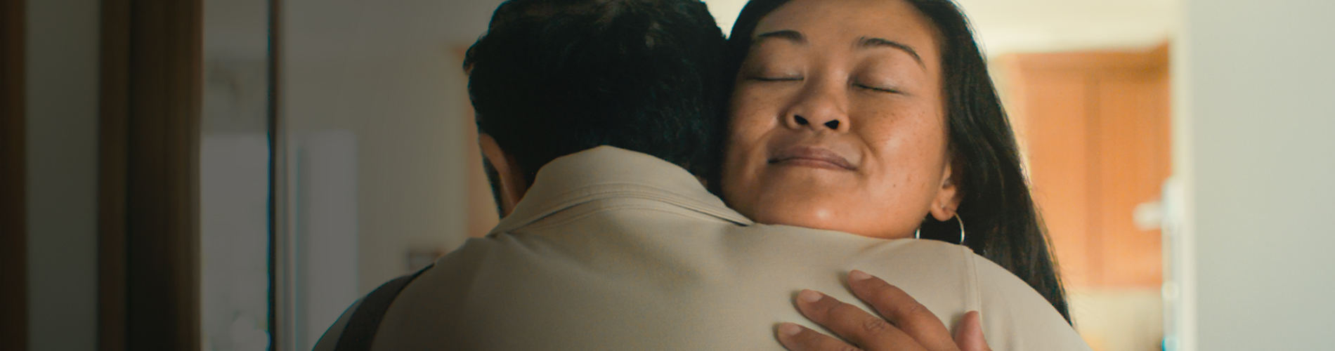 Woman hugging her husband