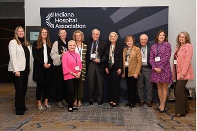 Dr Mirro IHA award with colleagues 