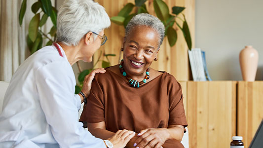 Doctor talking with patient