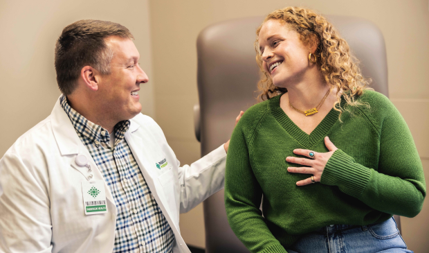Provider and patient talking and smiling