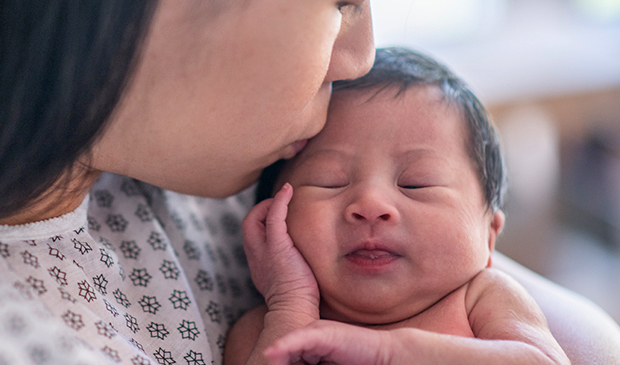 Mother holding newborn
